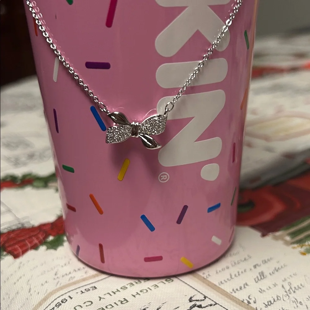 Chic Reversible Silver Bow Necklace with Cubic Zirconia Accent stones. - Picture 4 of 6